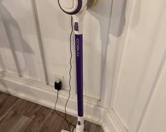 Battery powered vacuum with charger