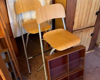 Apt/Outside
Tall folding chairs