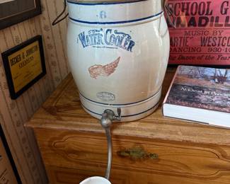 Hallway 
Redwing pottery water cooler-as is