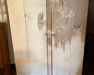 Apt/Outside
Tall early cabinet