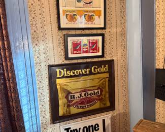 Front Room 
Cigarette signs 
Norwich labels framed