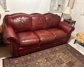 Full size burgundy leather couch