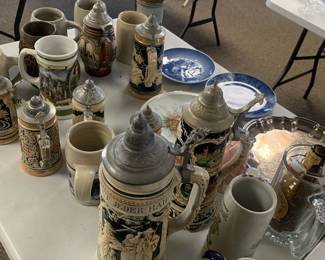 Lots of steins and mugs, about 30