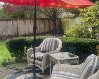 Pair of White Wicker Rocking Arm Chairs
