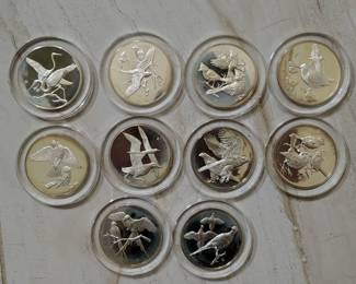 2 troy oz bird silver proof coins.