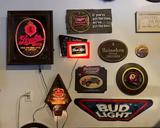 Vintage beer advertising signs: Stroh’s, Bud Light, Iroquois, Old German & more