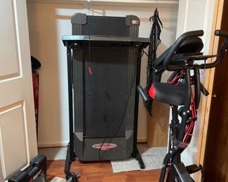 Exercise equipment including foldable bike, space saver tradml, free weights, & more