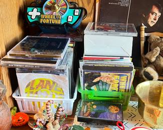 A selection of CDs including 90s computer games
