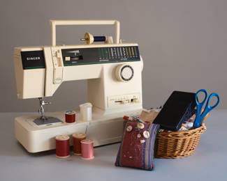 Singer sewing machine with plenty of notions