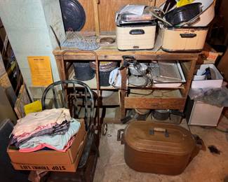 Basement. Down the stairs to the left.