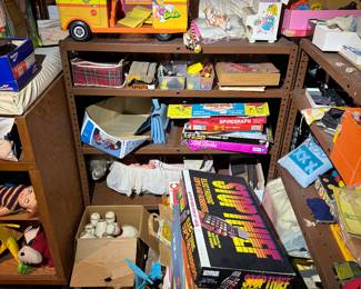 Basement. Down the stairs to the right in the kids and Avon area.