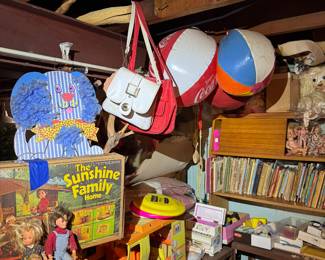 Basement. Down the stairs to the right in the kids and Avon area.