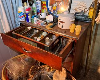 Basement. Down the stairs to the left.