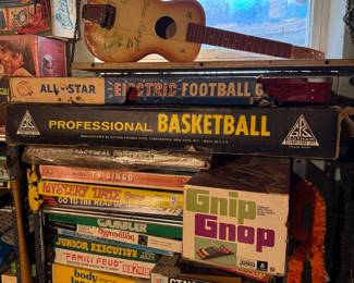 Basement. Down the stairs to the right in the kids and Avon area.