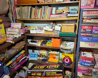 Basement. Down the stairs to the right in the kids and Avon area.