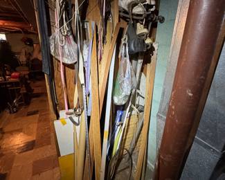 Basement. Down the stairs to the left.