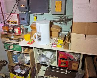 Basement. Down the stairs to the left.