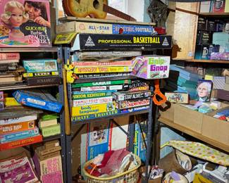 Basement. Down the stairs to the right in the kids and Avon area.