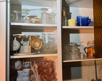 Basement. Down the stairs to the left.