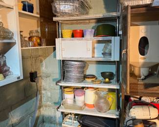 Basement. Down the stairs to the left.