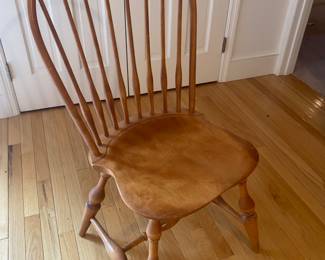 Set of 8 custom bow back chairs purchased from Paul Rich & Sons