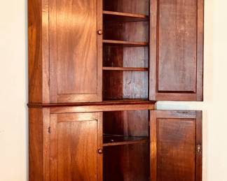Fantastic antique paneled walnut corner cabinet (detail)...