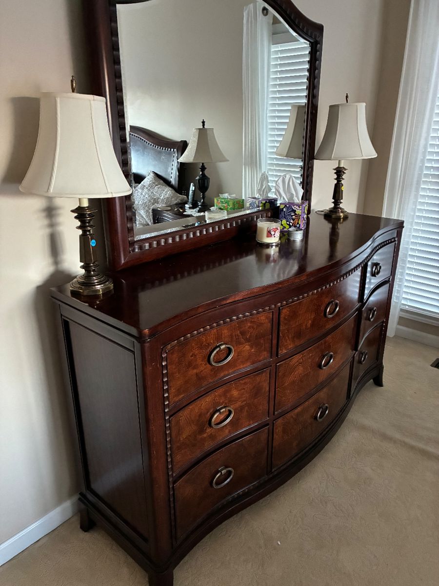 Universal furniture bedroom suit. Includes chest dresser, night stand and head and foot board. 