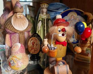 Russia smokers, icon, carved figurines, stacking dolls,rolly polly, and plates.