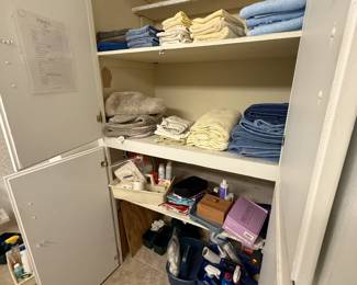 linen, cleaning supplies, bathroom