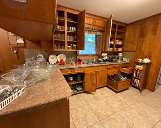 Kitchen full of baking supplies, glassware & more