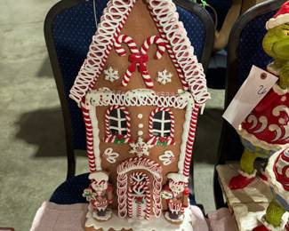 S Kirk & Son Sterling flatware, World War I US Signal Corps mirror, Jim Shore Christmas decor, beaded holiday placemats, The Grinch is in the Gingerbread houses