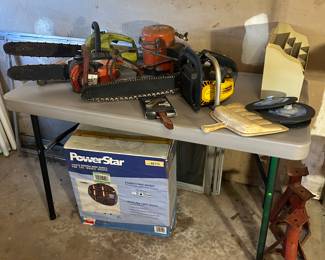 Various models of chainsaws . Power Star tankless water heater new in box . 