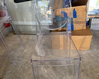 4 Acrylic counter chairs $200.00. Or best offer