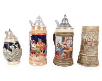 A Collection of Four German-Style Ceramic and Stoneware Beer Steins, including a Jos. Schlitz Commemorative Mug