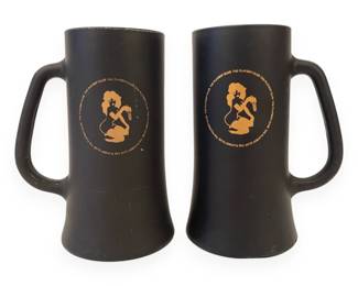 A Pair of 1970s The Playboy Club Matte Black Glass Beer Mugs