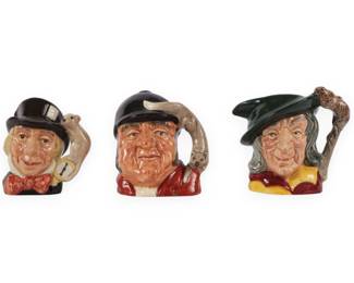 Three Royal Doulton Polychrome Glazed Ceramic Character Jugs: 'Mad Hatter,' 'Goose Away,' and 'Pied Piper'