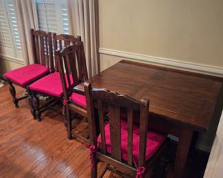 Antique Expandable Dining Table and Leather Upholstered Chairs