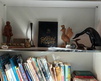 Books, Brass Elephants on Curved Wood 