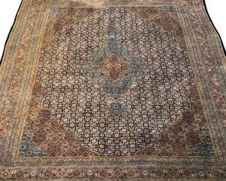 Large room size wool Bidjar in earth tone colors; 99” x 142”