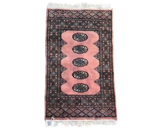 Rust/salmon colored Bokhara scatter rug; 32” x 51”