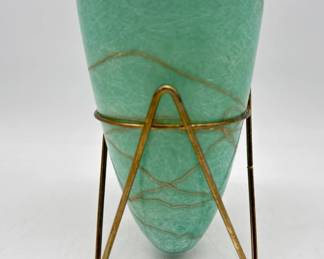 Mid century fiberglass bullet planter in brass tripod stand