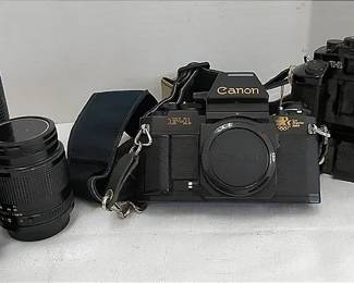 Canon F1 And A1 Film Cameras With Lenses