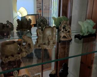 Asian stoneware carvings and jade piece..