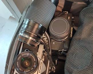 Olympus camera's with accessories 
Model CM-2