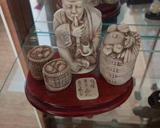 Carved resin Asian figure 