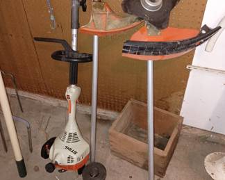 Stihl gas power weed wacker with two heads
