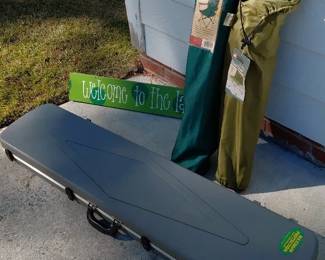 2 Outdoor Chairs, Gun rifle Case and Lake Sign