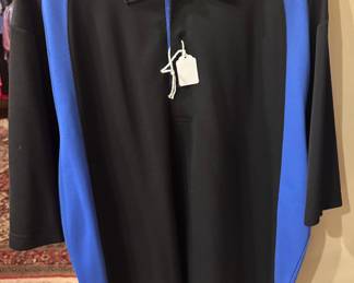 Men’s Black & Blue Short Sleeve Polo by Grand Slam Performance
Size Large