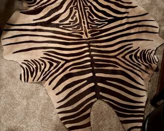 Zebra print cowhide rug