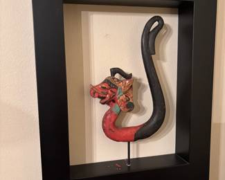 Framed hand-carved and painted wooden sculpture